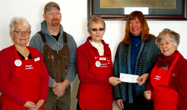 Giving and receiving a $3,000 donation from Loch Sloy, are: Bev Thompson, Auxiliary Treasurer, Steven Everall, Loch Sloy, Pam Strachan, Manager, Second Time Around Shop, Jacqui Burley, Manager, Loch Sloy and Fran Donaldson, Auxiliary Past President.