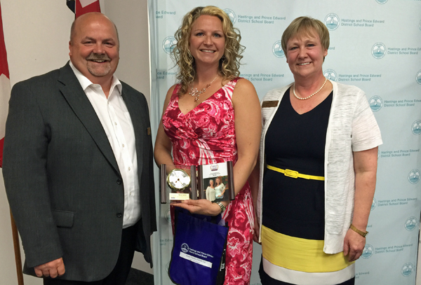 Monika Gajdosik with Hastings Prince Edward District School Board chair Dwayne Inch and Director Mandy Savery-Whiteway at the Great Place Awards. 