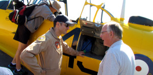 Harvard pilot Edward Soye shows George Wright the secret compartment.