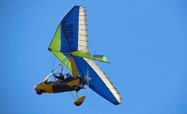 Jeff Douglass flying his Trike with Destiny, an advanced aviation instructor with Air Cadets.