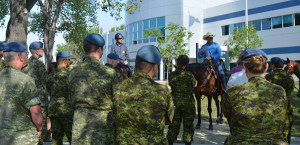 Paul-speaks-in-front-of-17-Wing-Headquarters