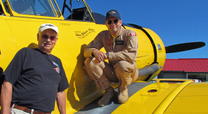 Prince Edward Flying Club President David Main with Harvard pilot Edward Soye.