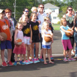 CML Snider community celebrates new basketball court and play area