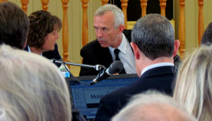 The tribunal's two-person panel, lawyers Robert Wright and Heather Gibbs, confer.