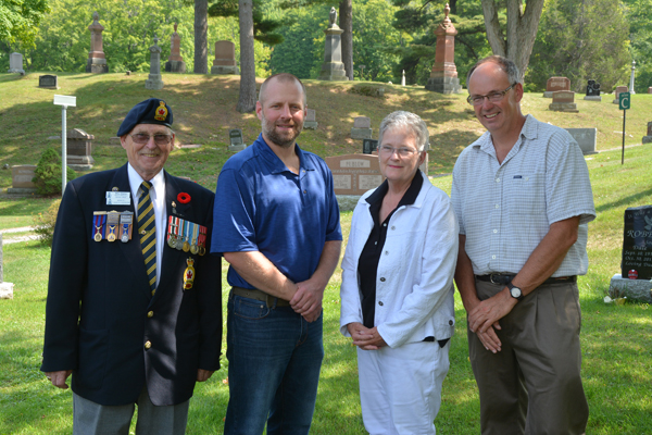 From left, Mike Slatter, Parade Marshal of Branch 78 RCL; Jeremy Black, Essroc Plant Director, Sandra Latchford, Chair of Glenwood Cemetery Board and Dan Wight, Essroc Safety Manager.  -Peggy deWitt photo
