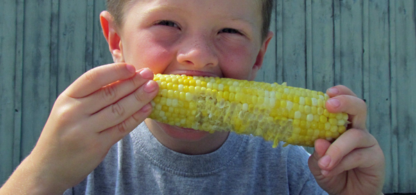 Sawyer-enjoying-his-corn