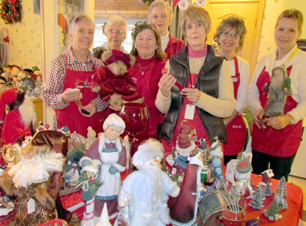 Prince Edward County Hospital Auxiliary volunteers in one room of many at Isaiah Tubbs' Lodge 1 showcasing the best Christmas offerings from the Second Time Around Shop.