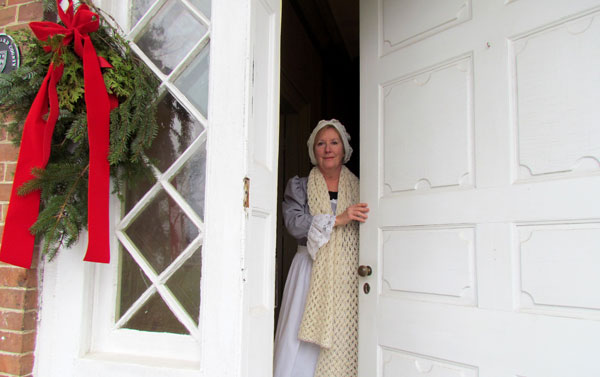 Francine Blais one of more than two dozen Friends of Macaulay House who welcome guests to enjoy a traditional Christmas.