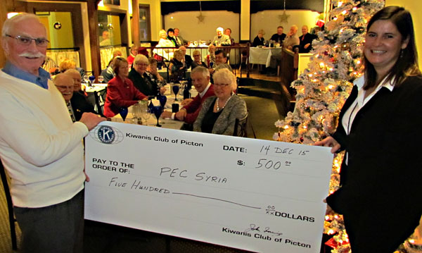 Kiwanis members presented a gift of $500 to PEC Syria at their Christmas meeting Monday in Picton.