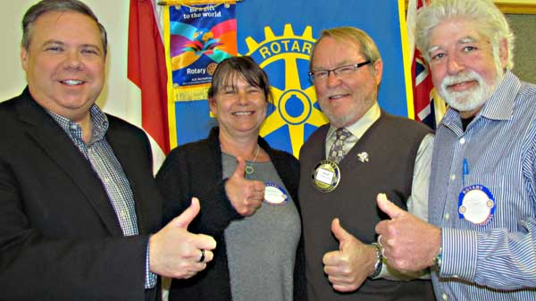 Predictions for 2016 were made at Rotary Tuesday, by Craig Desjardins, (left), Caroline Granger and Larry Ritchie, right, shown here with Rotary President Rob Leek.