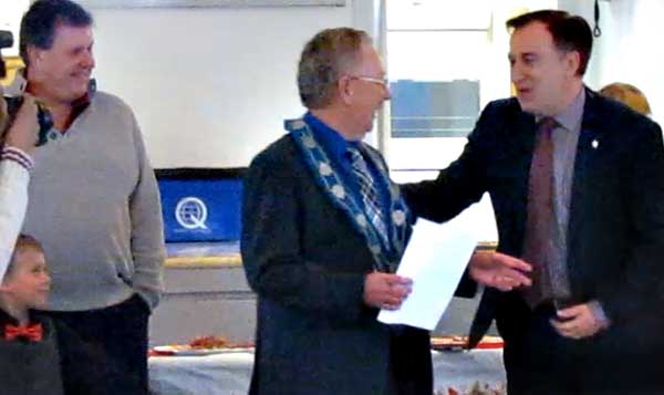 Prince Edward County Mayor Robert Quaiff thanks Neil Ellis, new Bay of Quinte MP, for his support.