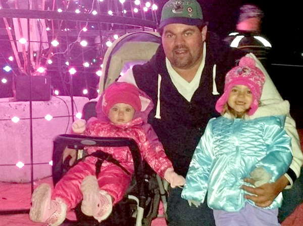 Travis Lambert with daughters
