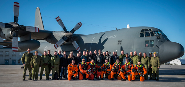 Last flight crew - RCAF Commander Lieutenant-General Michael Hood, final air crew and guests pose before boarding for CC130307’s retirement flight at 8 Wing/ Canadian Forces Base Trenton on April 5, 2016. Crew members include Major Philip Marcus (ADM(Pol)), Aircraft Commander, Maj. Keith Hoey (426 (T) Sqn), First Officer, Captain Brian Cormier (424 (T&R) Sqn), ACSO, Sergeant Simon Bourassa (424 (T&R) Sqn), Flight Engineer, Loadmasters Sgt. Derrick Matheson (424 (T&R) Sqn) and Master Corporal Tyler Simpson (424 (T&R) Sqn), and SAR Technician, Master Warrant Officer Wayde Simpson (1 CAD HQ TRSET Det Trenton). Also joining the crew are Maj. Micky Colton, CC130307 event coordinator from 424 (T&R) Sqn, and Warrant Officer Michael Hope, 424 (T&R) Sqn’s Deputy Operations Officer. Photo: Master Corporal St. Amour, 8 Wing Imaging