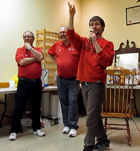 Auctioneer Adam Miller entertains another bid.