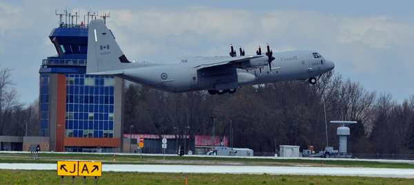 A CC-130J Hercules aircraft departed from 8 Wing/Canadian Forces Base (CFB) Trenton just after noon on Wednesday to assist in whatever way might be required at Fort McMurray in the wake of the devastating wildfires ripping through the city and surrounding area. Photo by Ross Lees