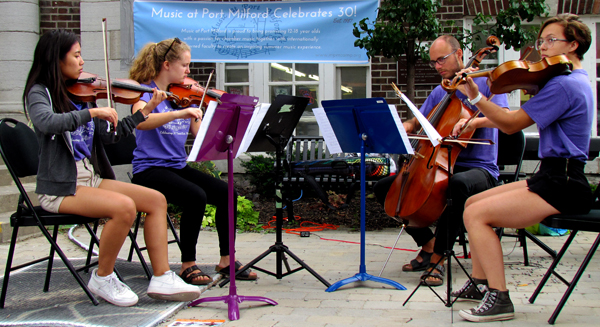 Students of Music at Port Milford performed outside the Picton and Wellington libraries earlier this month.
