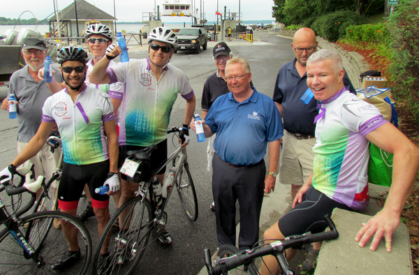 PEC Mayor Robert Quaiff, and councillors Gord Fox, Jim Dunlop and Steve Ferguson handed out more than 250 bottles of water to Friends for Life cyclists including, above, Jack Coop, Glenn Gundermann, Mark Moriz and Jeff Stevenson.