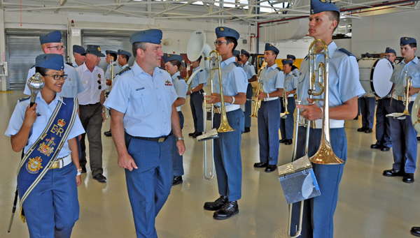 Reviewing Officer Colonel J. G. Proteau inspects the band at the Final Wings Parade at Mountain View Thursday afternoon. Ross Lees photo