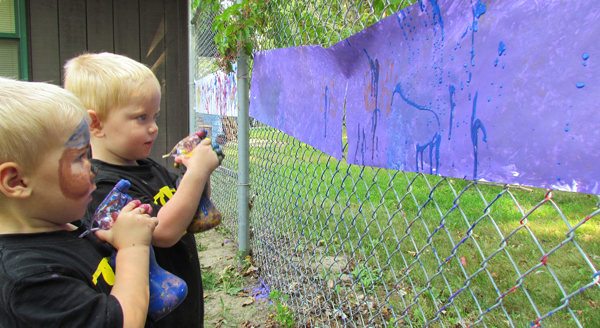 Batmans Caden and Asher prefer spray bottle painting.