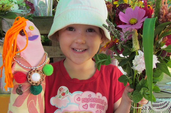 Ainsley Fraser was delighted with her visit to the event having made a puppet she named Sally and buying a bouquet of fresh cut flowers.