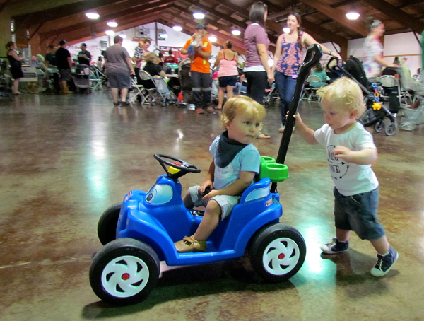 Landon Scanlon and Ethan Valleau amuse themselves while registrations were under way for the baby show.