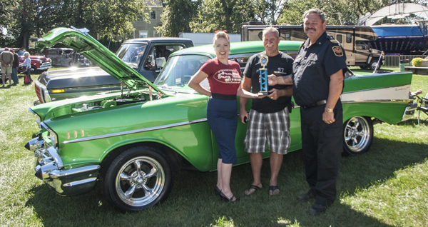 Miss Mandy Mae and Troy Irvine with Mike Branscombe and the car show winner.