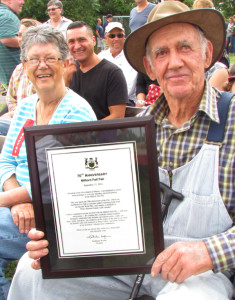 Sandra Emlaw and Wilber Miller with the certificate from Premier Kathleen Wynne on behalf of all those who were in attendance at Milford's first fair in 1946.