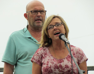 Fair President Steve Ferguson with Kim Inch, singing O'Canada.