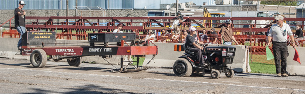 Tracy Willis of Picton goes 97 feet in the lawn tractor pull.