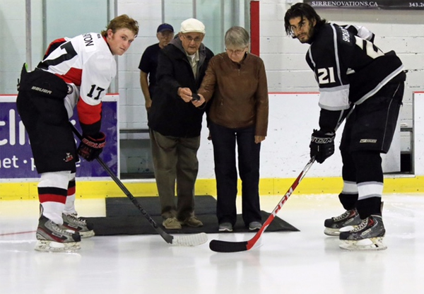 Pirates Captain Tye Eaton with special guests Wayne and Myrtle Tod and Raiders Captain Austin Boulard.