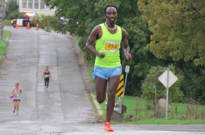 Teresa Fekensa running down Mill Street.