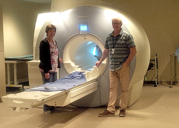 Pictured with the current MRI machine at QHC-BG is charge MRI technologist Terry Lightle and MRI technologist Tracy Lightle.