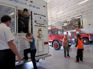 Gord Bell and Division One Commander Rob Manlow led tours through the "smoke house" safety trailer.