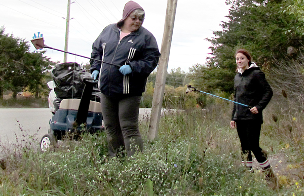 Lisa and Kayla Mills started their clean up at the County Barns, then "followed the garbage" along County Road 10 and up the hill to the heights.