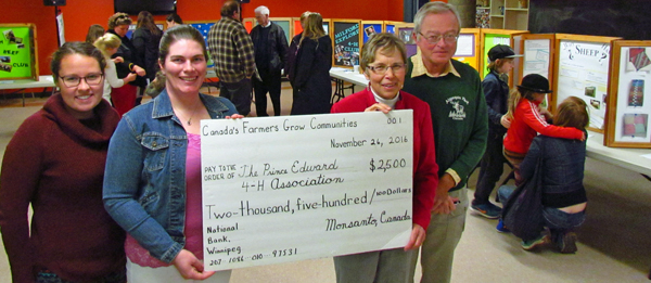 Showing of the $2,500 grant during the 4H open house and registration are Alissa Rabbie, Shannon Desjardins, Jane Thompson and John Garside.