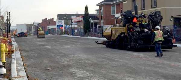 Base asphalt was poured on Main Street Tuesday. - BIA photo