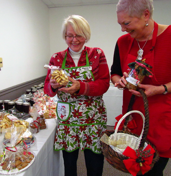 Sharron Hewer and Dorthy Speirs Vincent helped set up many tables of sweets, breads, jams and preserves.