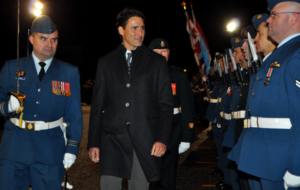 Prime Minister Justin Trudeau inspected the troops that formed a 100-person Honour Guard to welcome him to the base along with the band and 8 Wing Leadership Thursday evening to end the first day of his campaign-style cross-country tour. Ross Lees photo