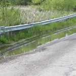 County explores returning some roads to gravel