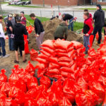 Senior Panthers fill sandbags for community members in need