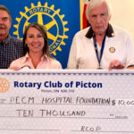Rotary uncorks $10,000 for County's hospital