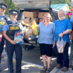 Community 'Crams the Cruiser' in Food Bank fundraiser