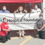 Grocery shoppers backing the hospital build $2 at a time