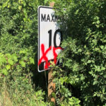 Garbage dumped; new Millennium Trail signs vandalized
