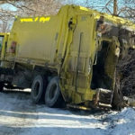 Garbage truck, cube van collide