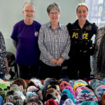 Hats off to Hospital Auxiliary Crafters and OPP for keeping County kids warm