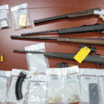 Two face gun, drug and stolen property charges